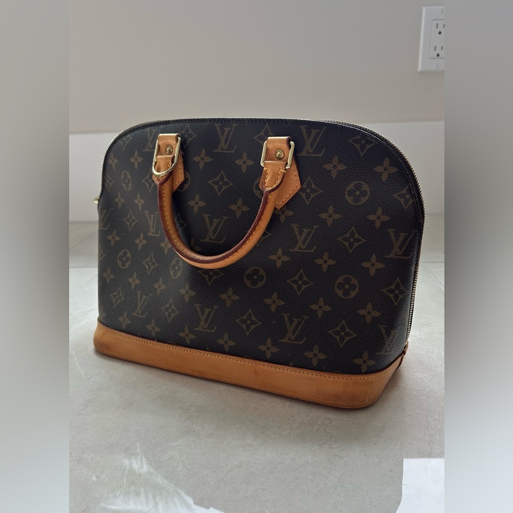 Louis Vuitton Alma Handbag Monogram